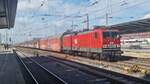 143 344-0 der MEG mit Autowagen durch Bremen Hbf am 18.03.2023